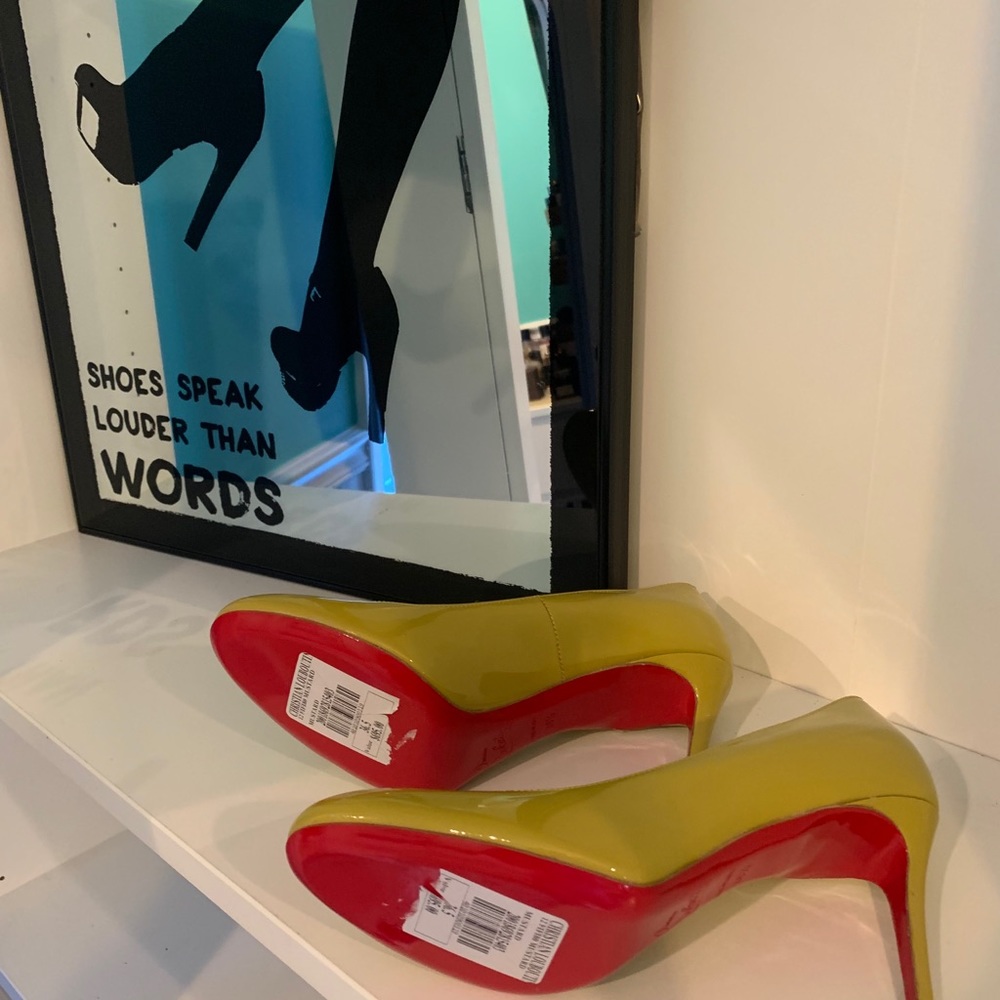 Authentic Olive Green Christian Louboutin Pumps.